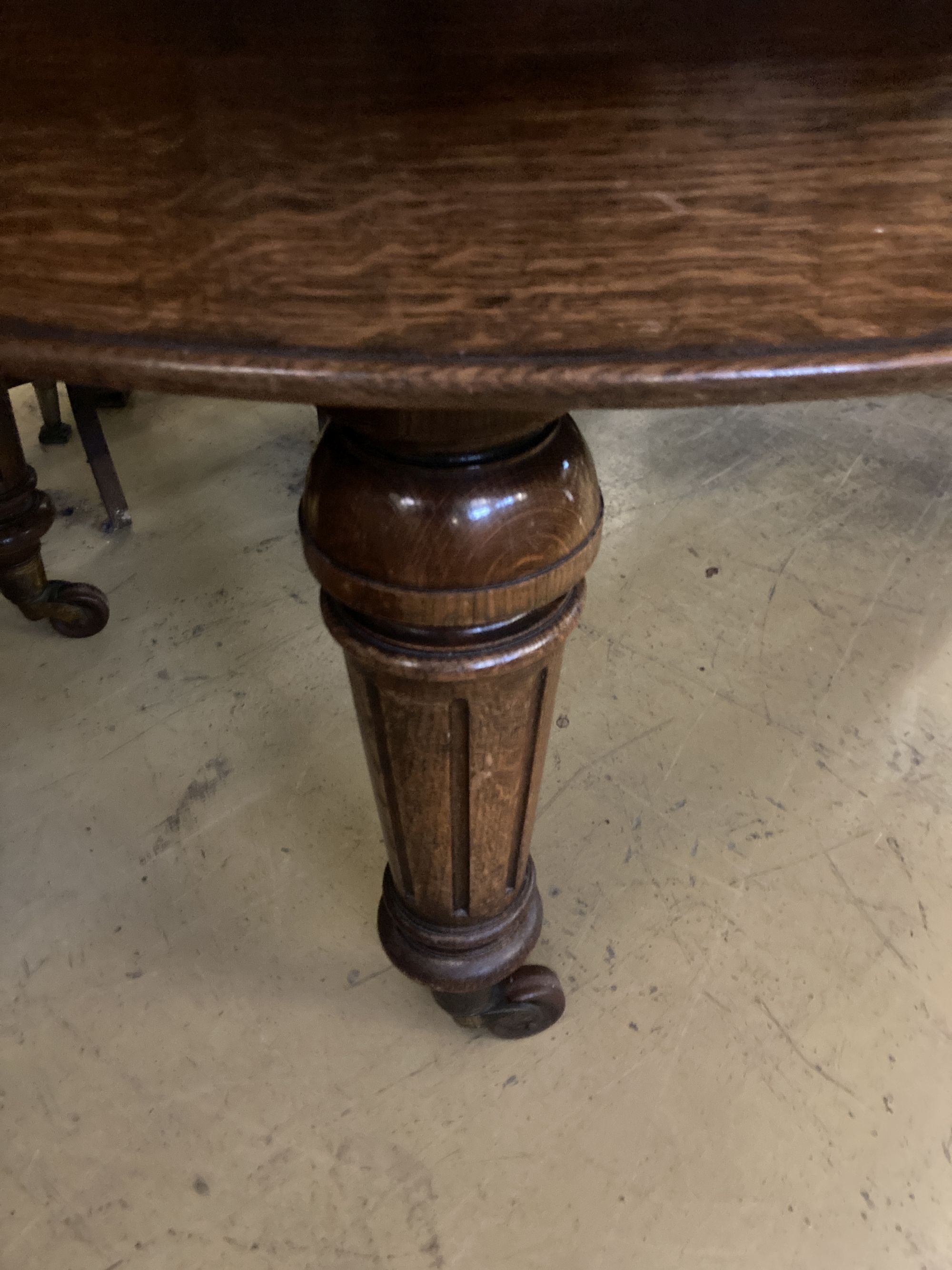 A Victorian oak extending dining table, length 320cm extended (five spare leaves), width 140cm, height 76cm